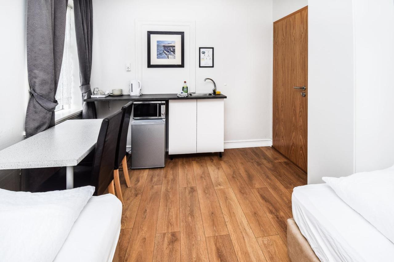 Tweepersoonskamer met 1 of 2 Bedden en Gedeelde Badkamer